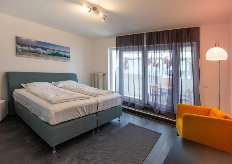 Double room with balcony, shared bathroom and kitchen Area 24|7 EUROPLATZ Karlsruhe